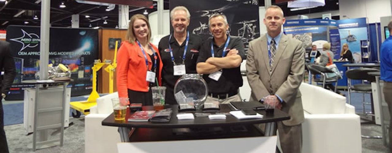 Team members from Air Services and Dakota Air Parts at Heli-Expo booth
